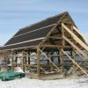 Barn being supported during construction